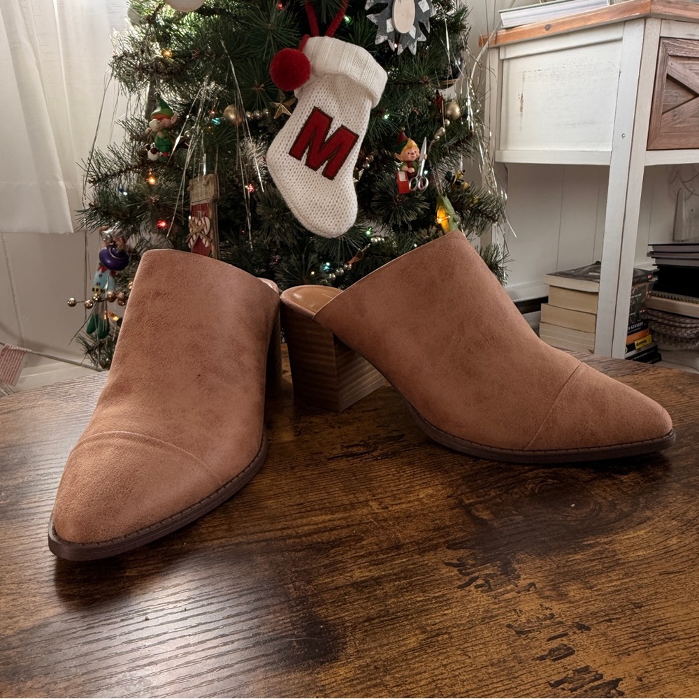 Report Heeled Mule